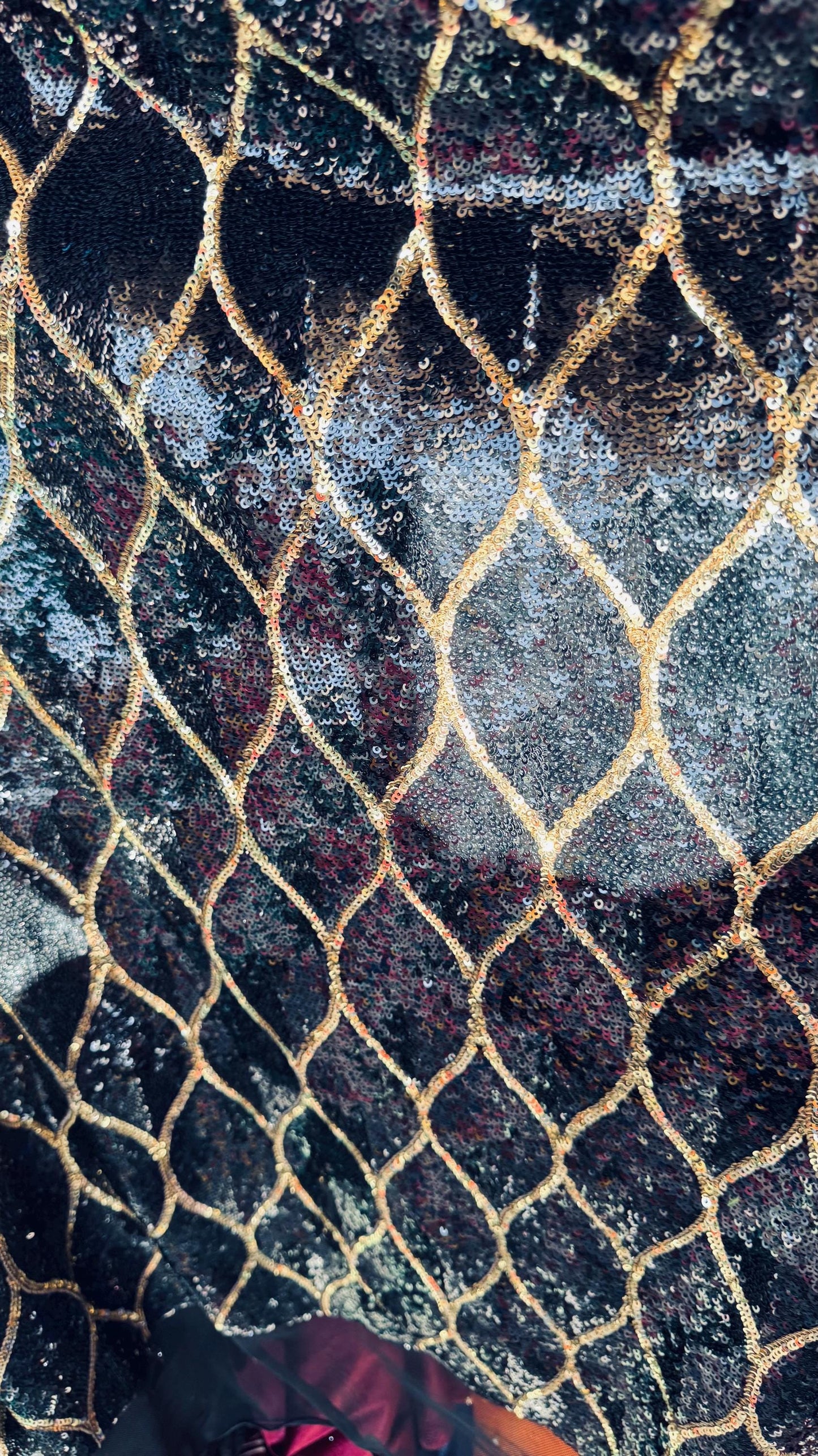 Abstract design cosmic glitz sequins Black/Gold on stretch mesh 2-way 52/54” Sold by the yd Ships worldwide from Los Angeles California USA