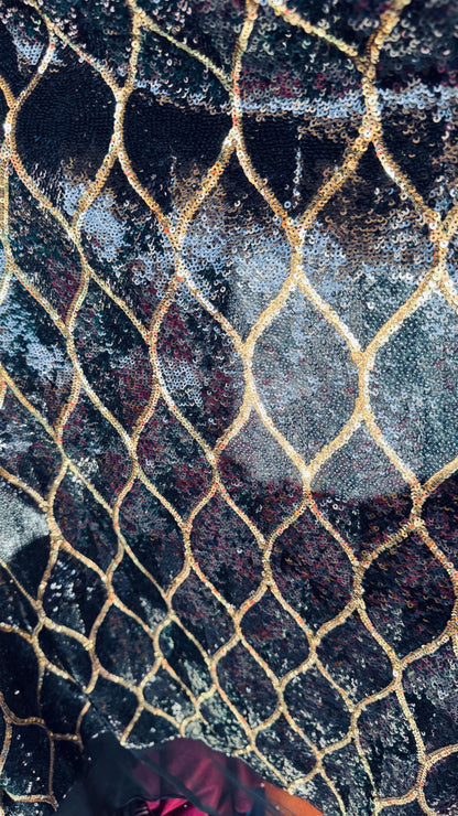Abstract design cosmic glitz sequins Black/Gold on stretch mesh 2-way 52/54” Sold by the yd Ships worldwide from Los Angeles California USA