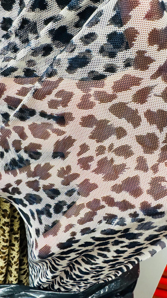 New Cheetah design print on power mesh nylon spandex 4-way stretch 58/60” Sold by the YD. Ships worldwide from Los Ángeles California USA.