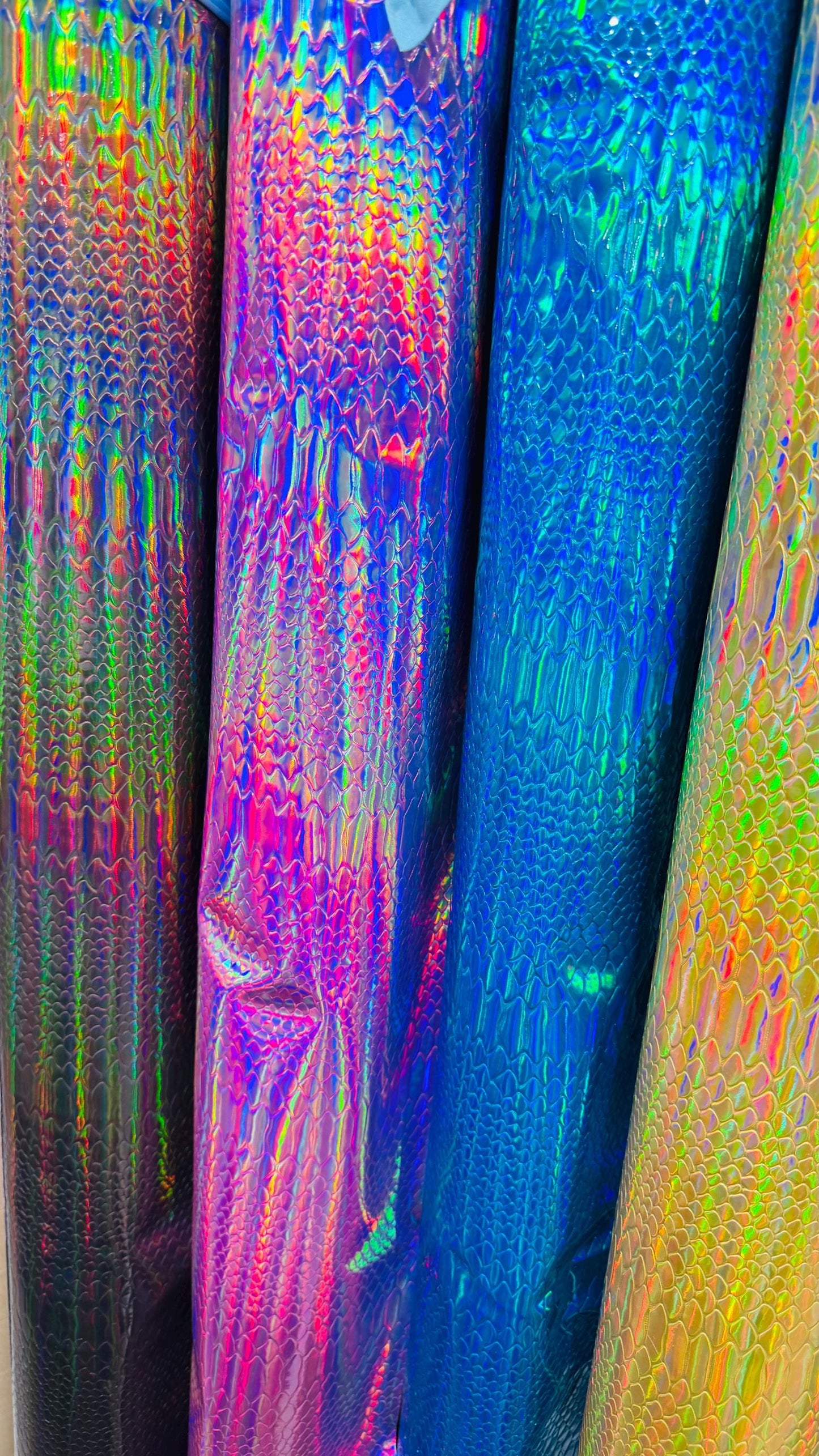 New heavy vinyl Exotic Snake design with iridescent foil all over non stretch 58/60" Sold by the YD. Ships worldwide from Los Angeles CA