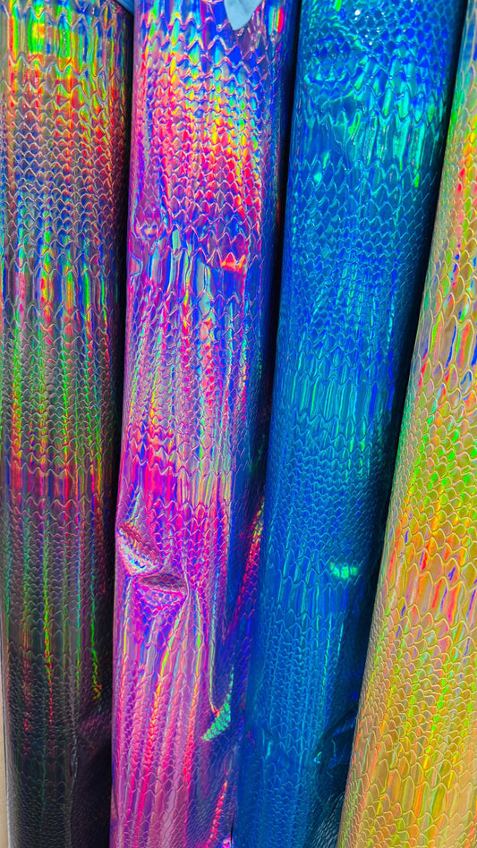 New heavy vinyl Exotic Snake design with iridescent foil all over non stretch 58/60" Sold by the YD. Ships worldwide from Los Angeles CA