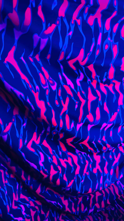New UV light reflective Tiger abstract design Neon Ponk/Black  print on  heavy nylon spandex 4-way stretch 58/60” Sold by the YD.
