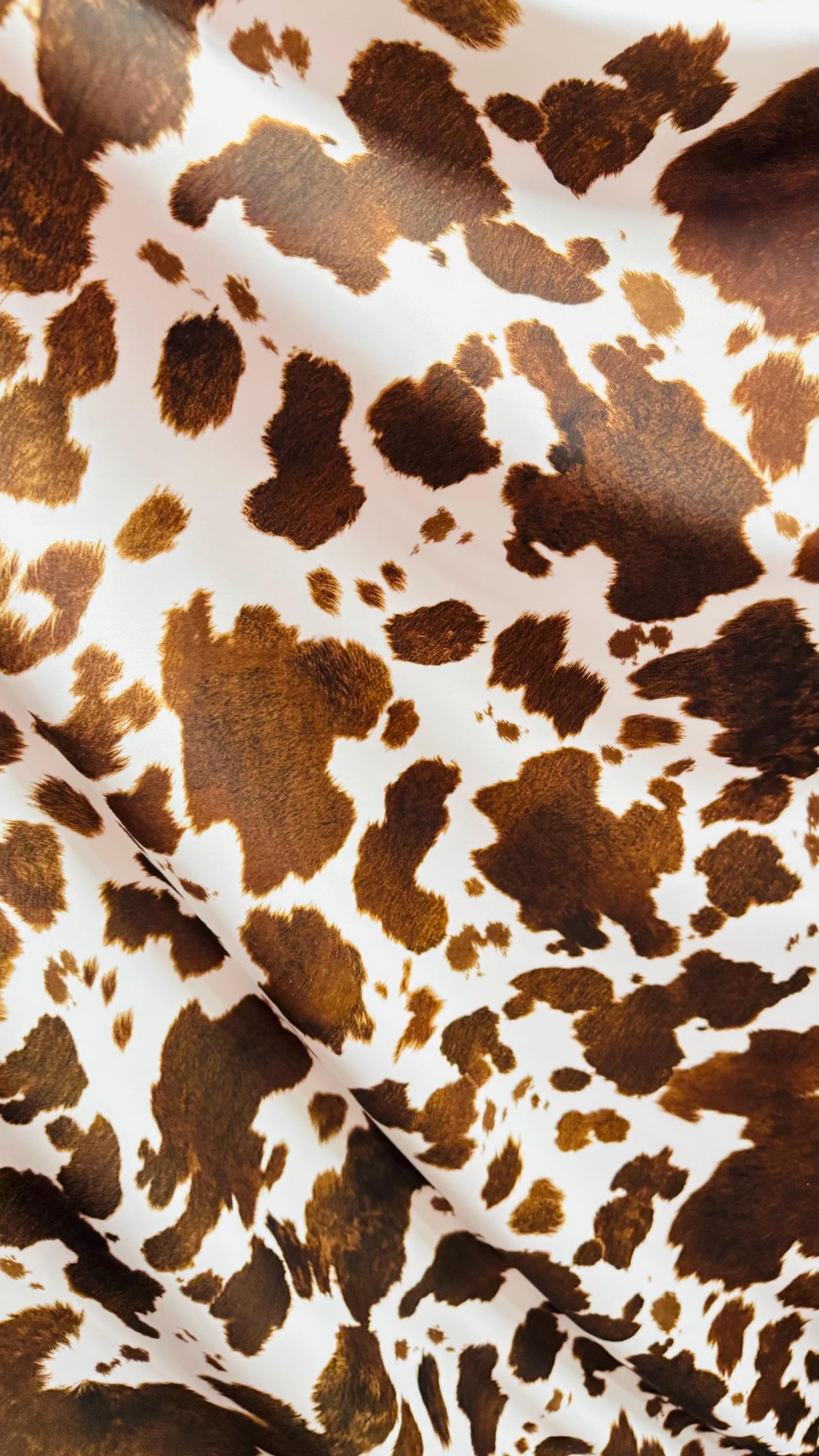 Cow Exotic design white/brown print on great quality of nylon spandex 4-way stretch 58/60” Sold by the YD. Ships Worldwide from Los Angeles