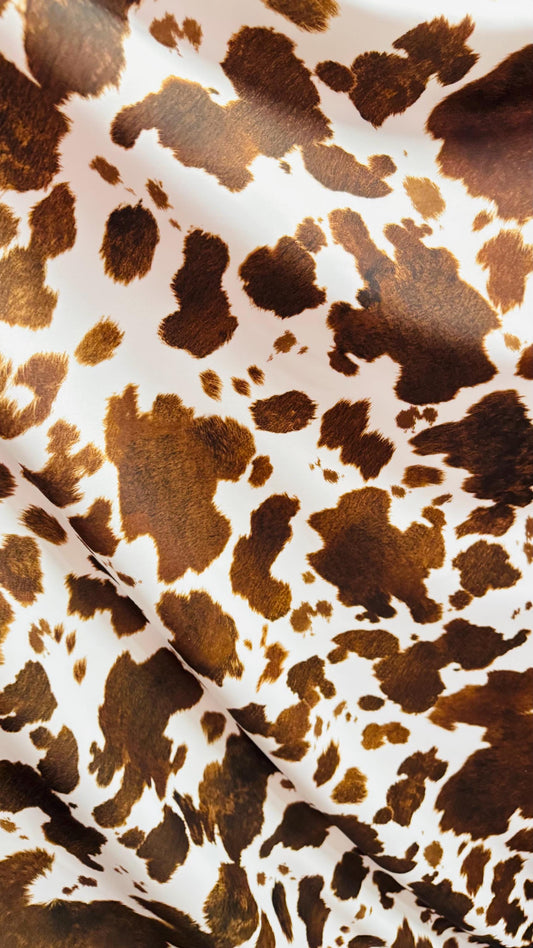 Cow Exotic design white/brown print on great quality of nylon spandex 4-way stretch 58/60” Sold by the YD. Ships Worldwide from Los Angeles