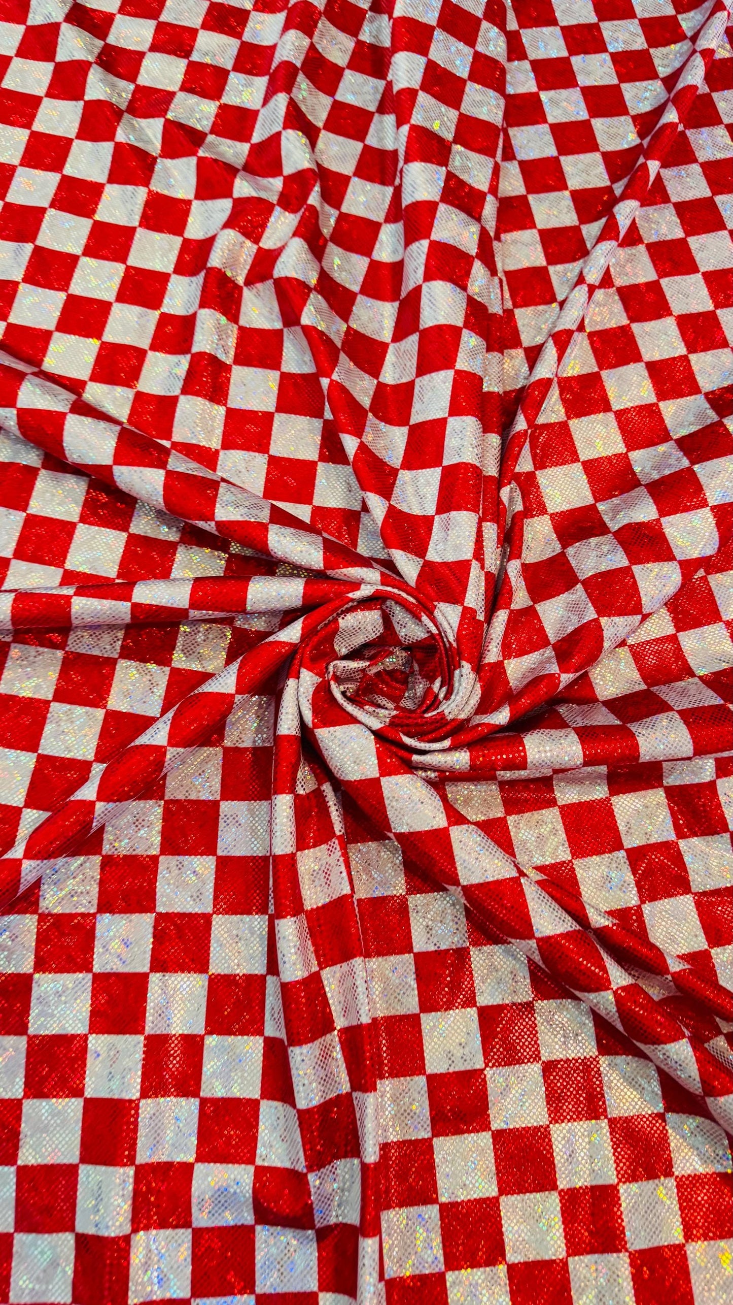 Checkers design 1” size  on shattered glass New metallic hologram nylon spandex 4-way stretch 58/60” Sold by the YD. Ships worldwide