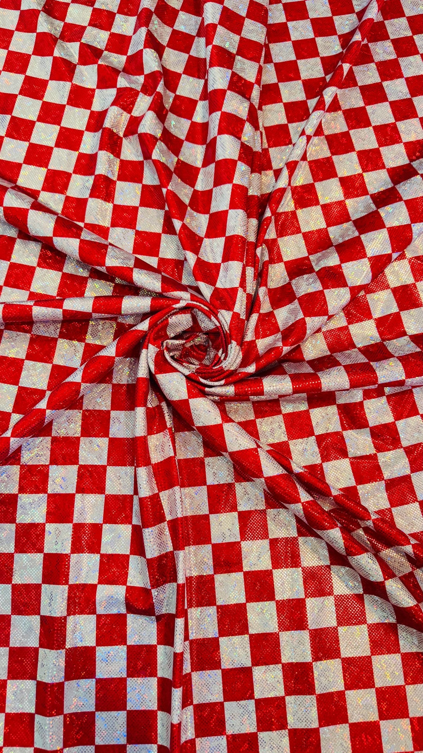 Checkers design 1” size  on shattered glass New metallic hologram nylon spandex 4-way stretch 58/60” Sold by the YD. Ships worldwide