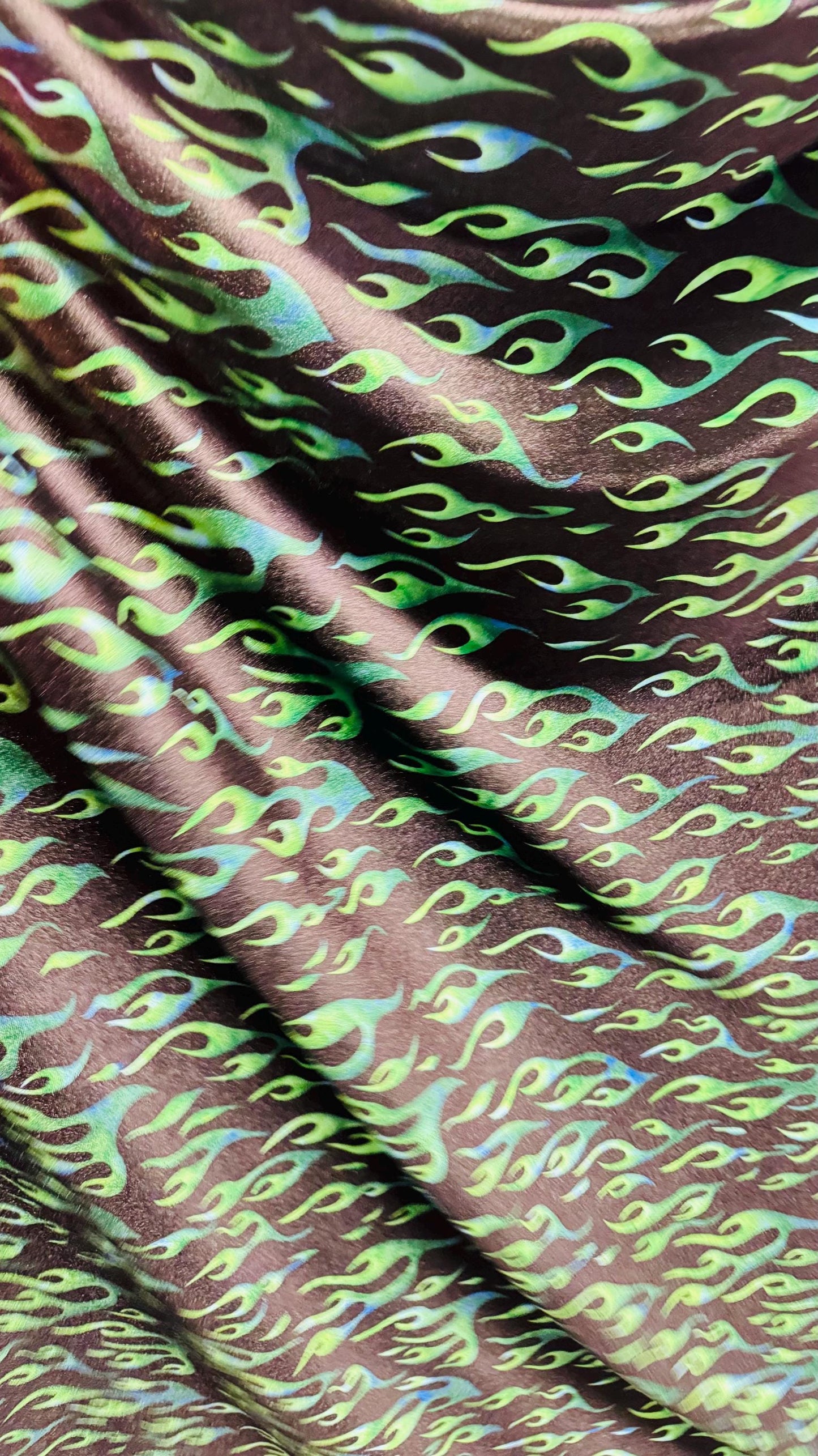 Flames design Black/Green print on best quality of stretch velvet 4-way stretch 58/60” Sold by the YD. Ships Worldwide from Los Angeles CA