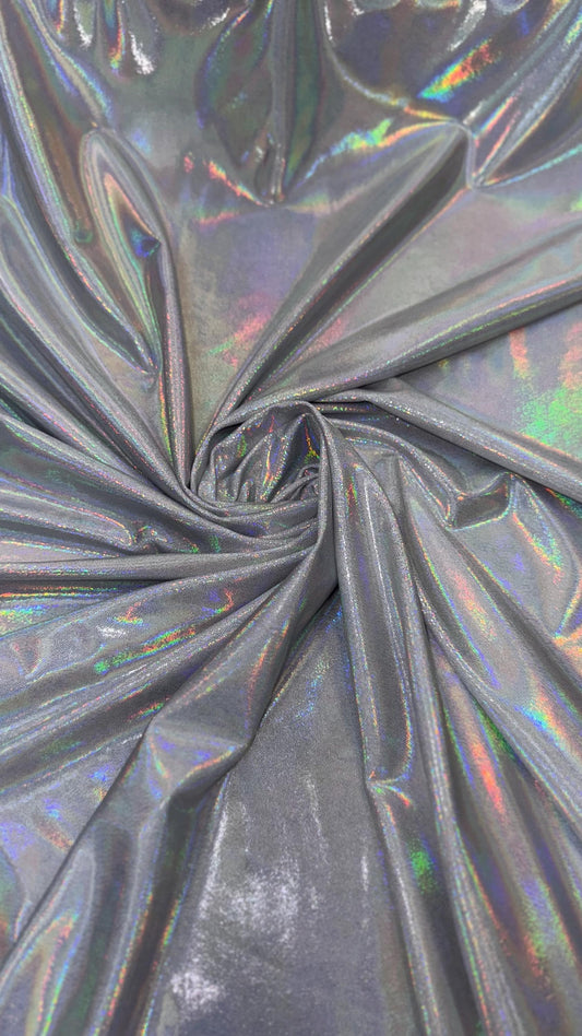 New oil slick iridescent white/silver hologram metallic nylon spandex  4-way stretch 58/60” Sold by the YD. Ships worldwide from L.A
