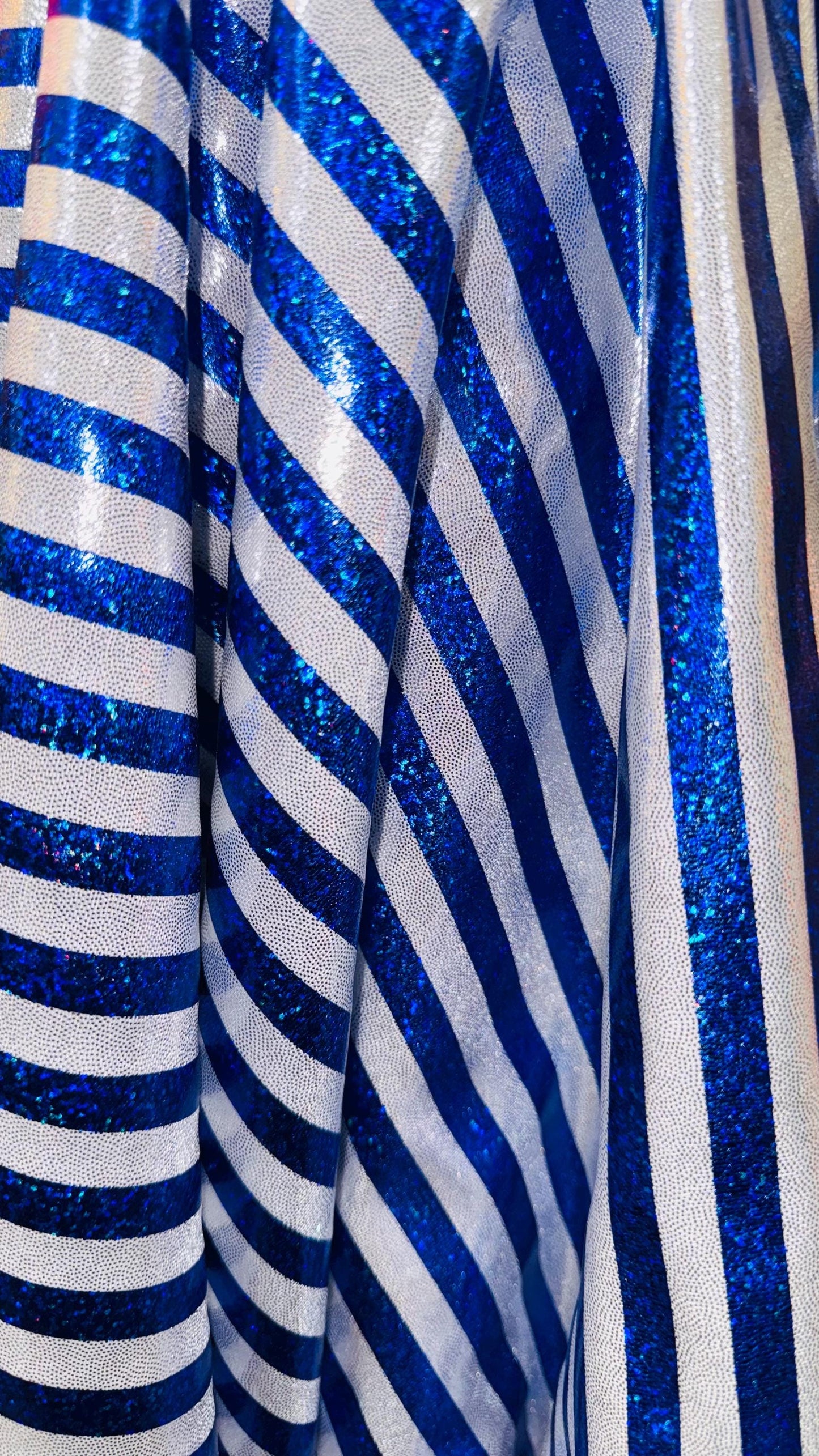 Stripe design nylon spandex 4way Hologram metallic foil Blue/Silver  58/60" sold by the Yd. Ships worldwide from Los Angeles California USA.