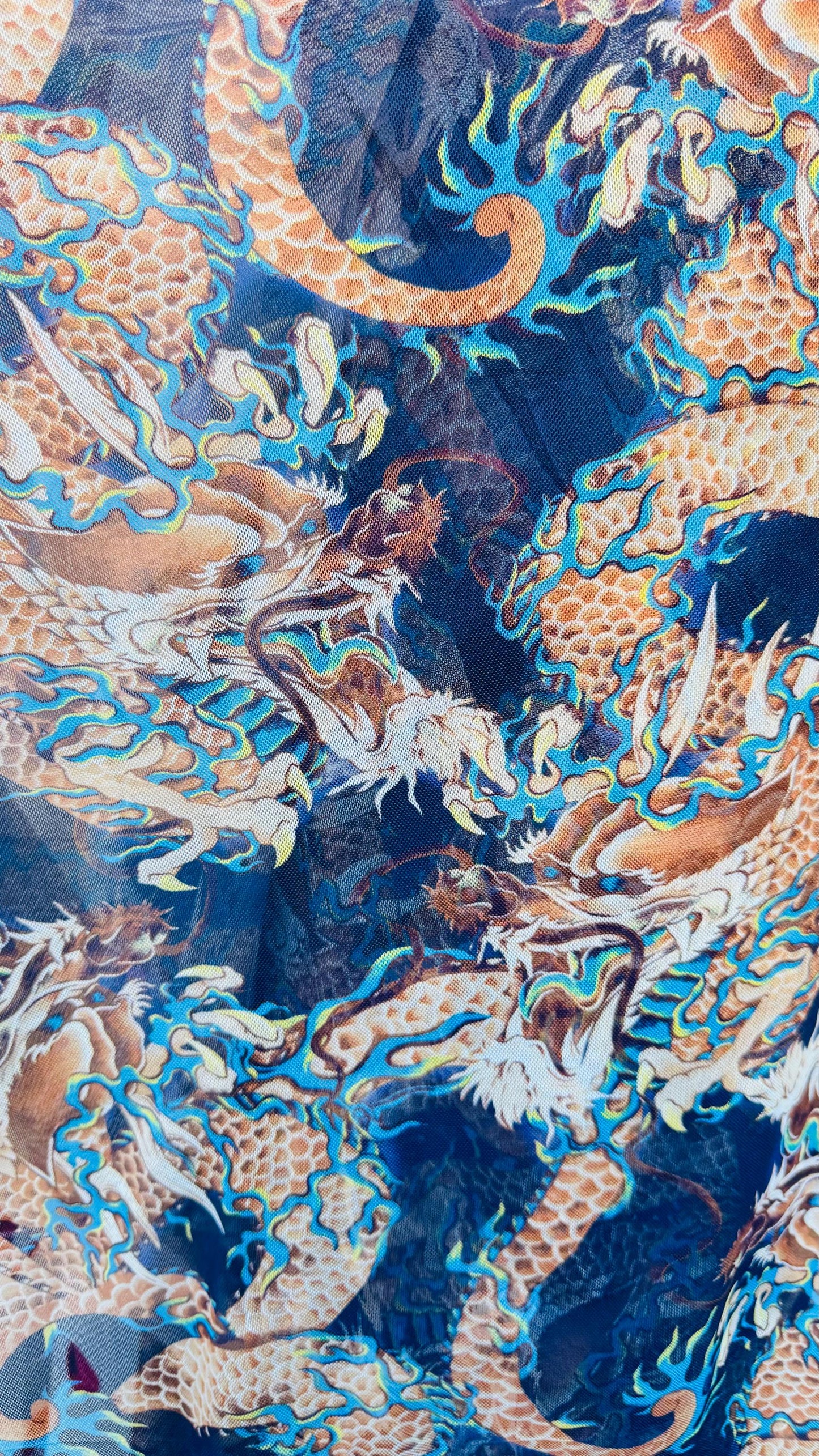 Japanese Dragon Exotic design Multicolor print on power mesh nylon spandex 4-way stretch 58/60” Sold by the YD. Ships worldwide from L.A
