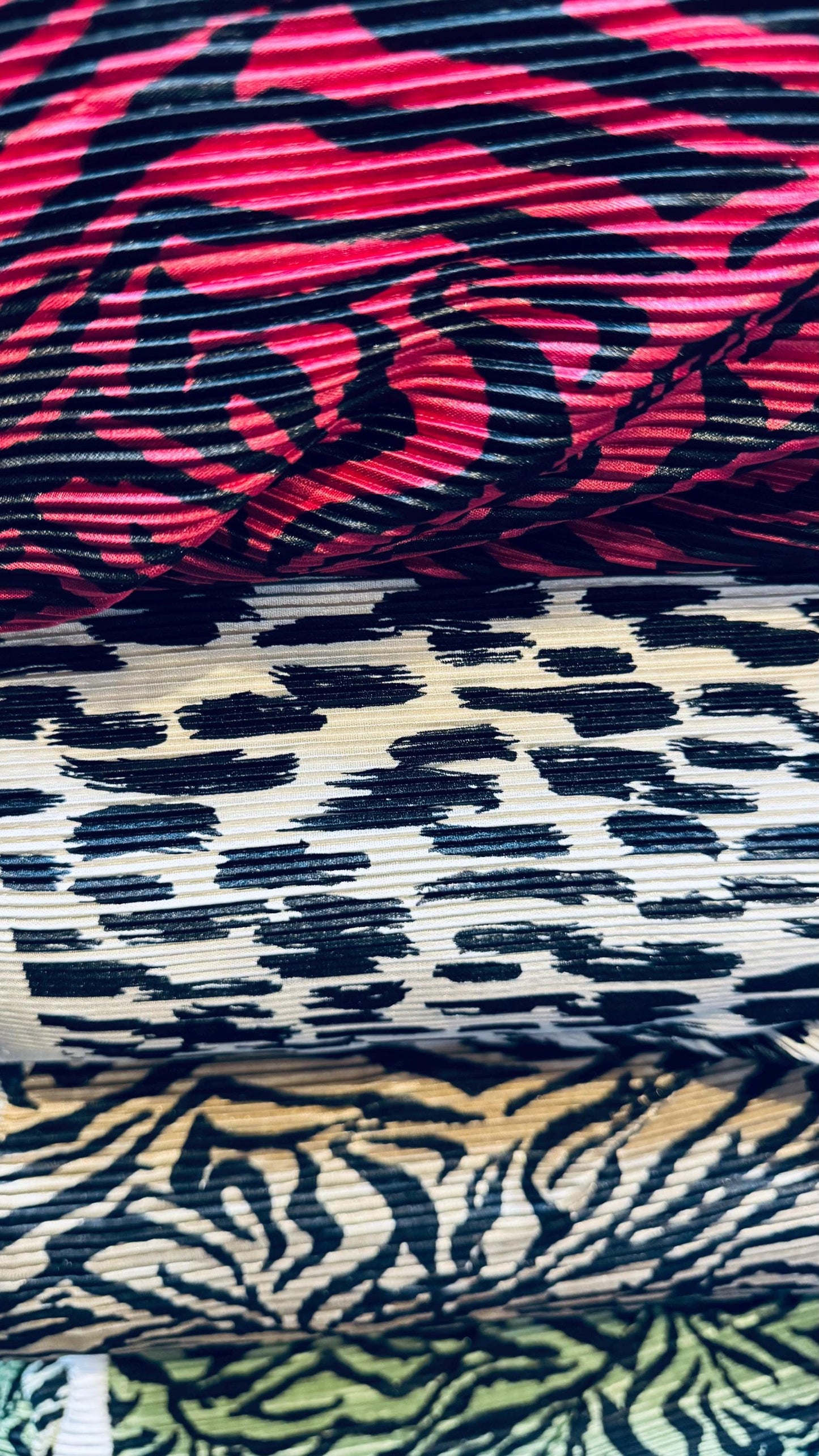 Exotic animal print leopard and zebra design print on pleated poly spandex fabric 58/60” Sold by the YD. Ships Worldwide from Los Angeles CA