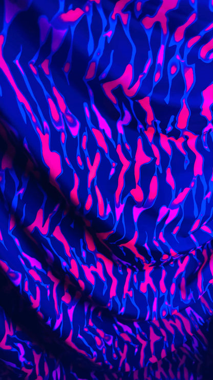 New UV light reflective Tiger abstract design Neon Ponk/Black  print on  heavy nylon spandex 4-way stretch 58/60” Sold by the YD.
