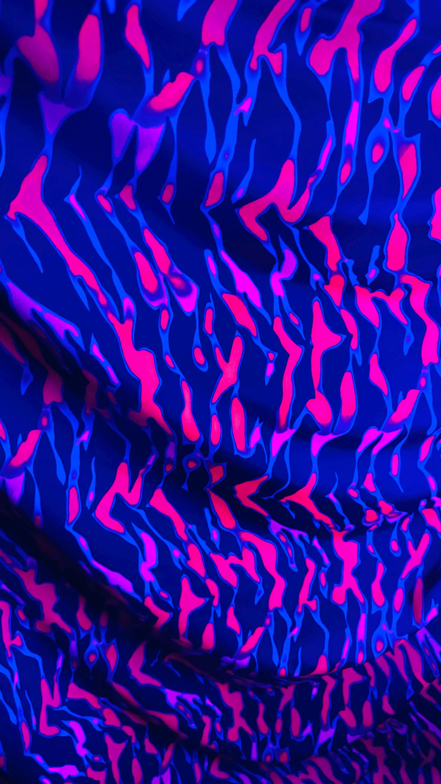 New UV light reflective Tiger abstract design Neon Ponk/Black  print on  heavy nylon spandex 4-way stretch 58/60” Sold by the YD.