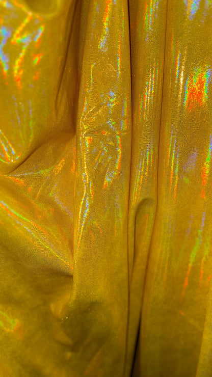 New Iridescent foggy foil oil effect metallic nylon spandex and iridescent metallic vinyl 4way stretch Sold by the YD. Ships worldwide