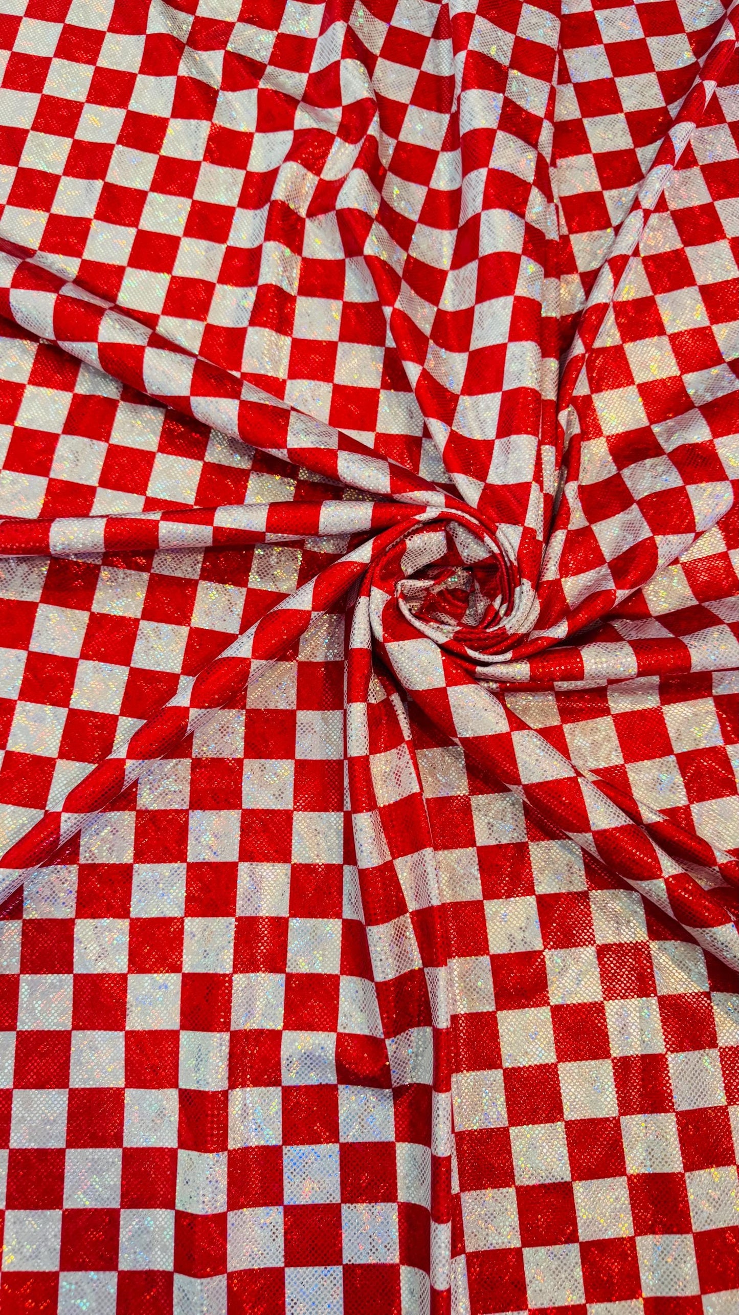 Checkers design 1” size  on shattered glass New metallic hologram nylon spandex 4-way stretch 58/60” Sold by the YD. Ships worldwide