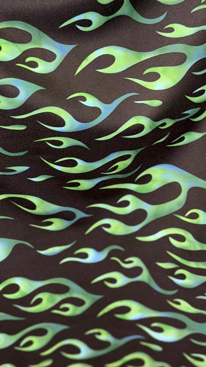 Hot flame design black/Green  print on heavy nylon spandex 4way stretch 58/60" Sold by the YD. Ships worldwide from Los Angeles California