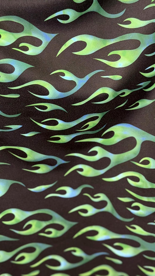 Hot flame design black/Green  print on heavy nylon spandex 4way stretch 58/60" Sold by the YD. Ships worldwide from Los Angeles California