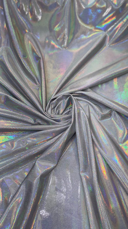 New oil slick iridescent white/silver hologram metallic nylon spandex  4-way stretch 58/60” Sold by the YD. Ships worldwide from L.A