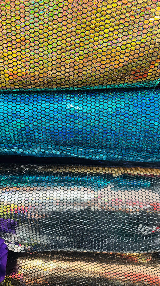 Honeycomb Hologram iridescent sequins trans on Nylon metallic 2-way stretch 58/60” Sold by the YD. Ships worldwide from Los Angeles Californ