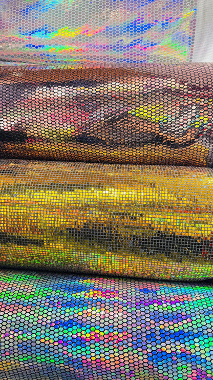 Honeycomb Hologram iridescent sequins trans on Nylon metallic 2-way stretch 58/60” Sold by the YD. Ships worldwide from Los Angeles Californ