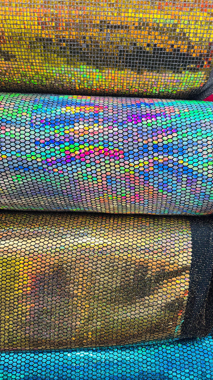 Honeycomb Hologram iridescent sequins trans on Nylon metallic 2-way stretch 58/60” Sold by the YD. Ships worldwide from Los Angeles Californ