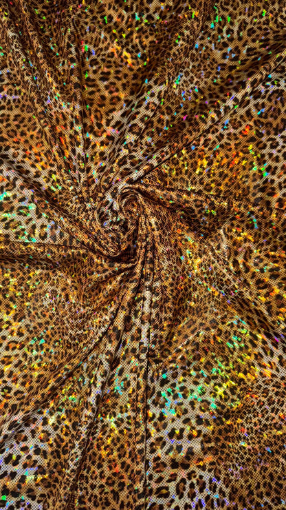 Cheetah hologram design New shattered glass hologram  metallic nylon spandex 4-way stretch 58/60” Sold by the YD. Ships worldwide from LA CA