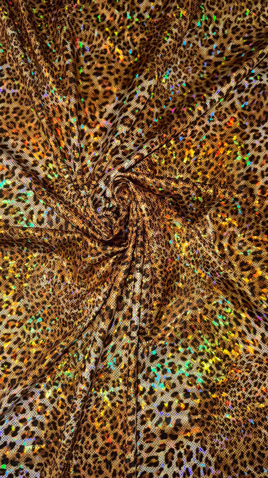 Cheetah hologram design New shattered glass hologram  metallic nylon spandex 4-way stretch 58/60” Sold by the YD. Ships worldwide from LA CA