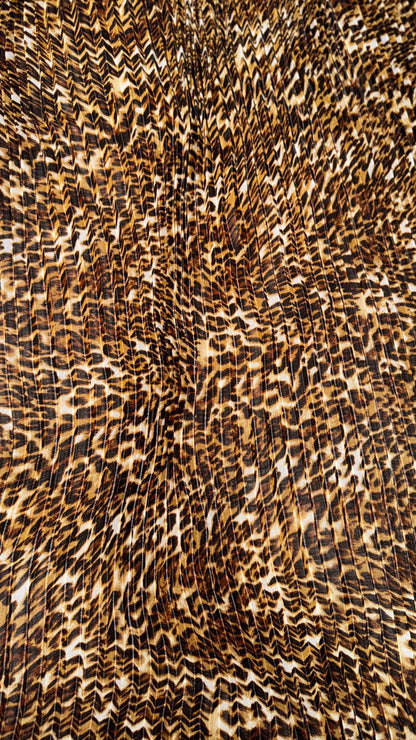 New Exotic leopard design print on high quality of multi chiffon pleated accordion style non stretch 58/60” Sold by the YD. Ships Worldwide