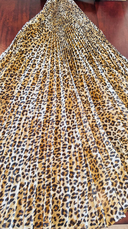 Sunburst pleated Silky Chiffon Cheetah Design non stretch 190” length by 60” width Sold by the PC. Ships worldwide from Los Angeles CA