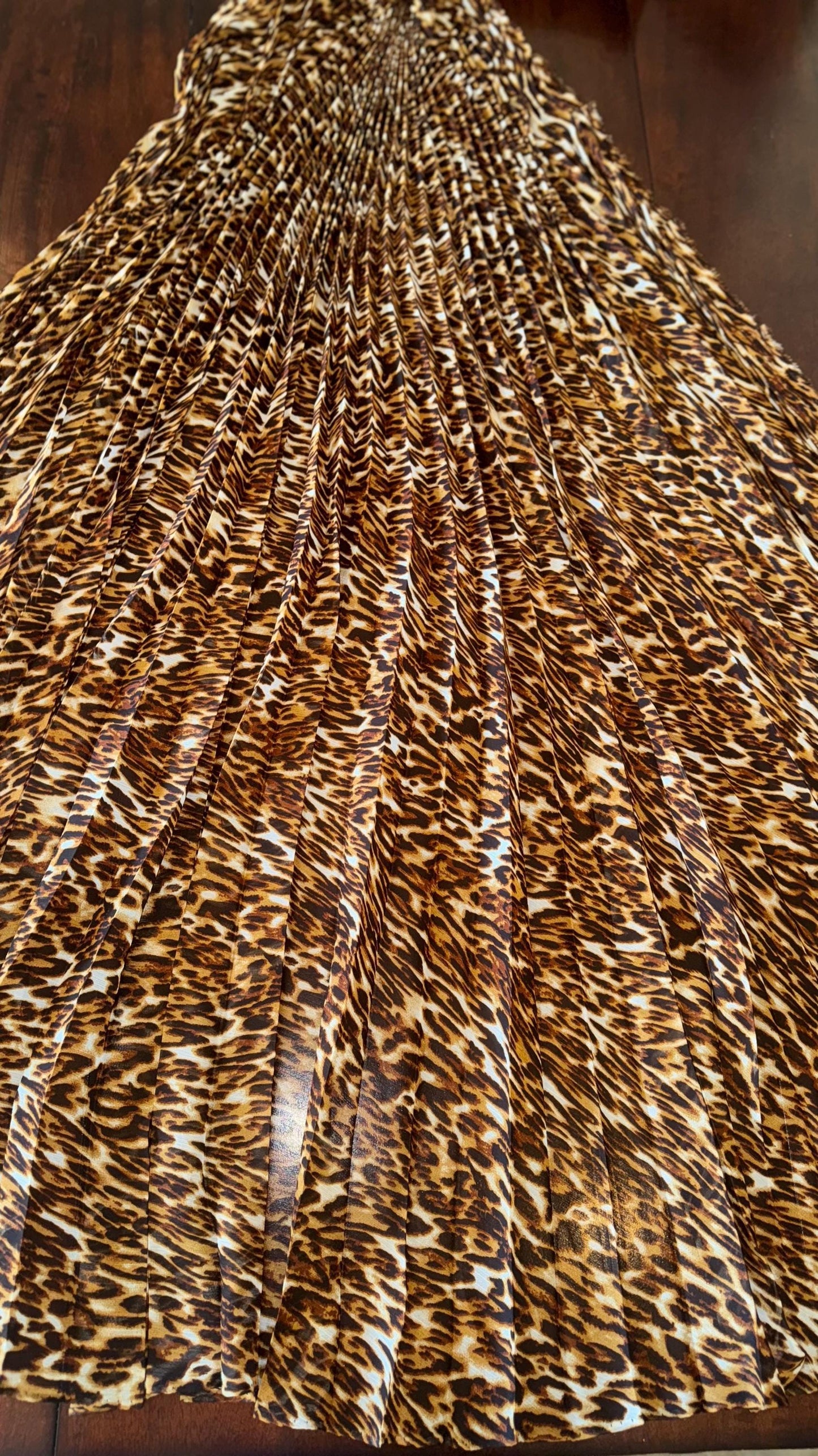 Sunburst pleated Silky Chiffon Leopard Design non stretch 190” length by 60” width Sold by the PC. Ships worldwide from Los Angeles CA