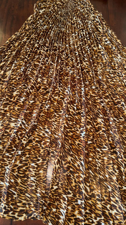 Sunburst pleated Silky Chiffon Leopard Design non stretch 190” length by 60” width Sold by the PC. Ships worldwide from Los Angeles CA