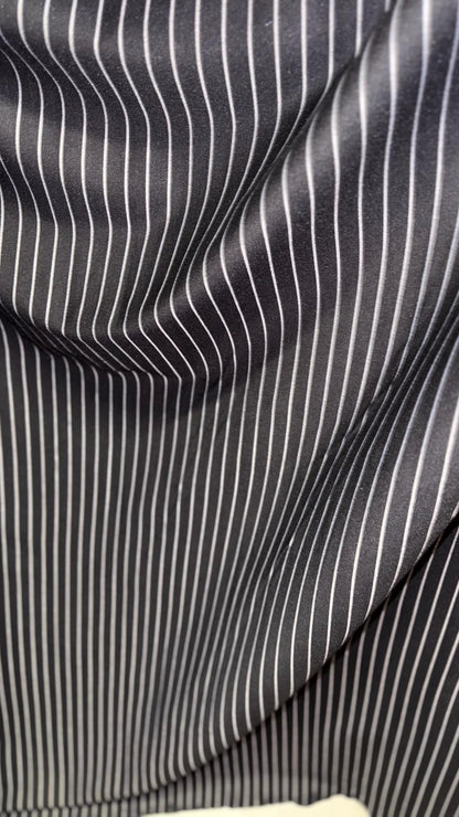 Pin stripes on spandex ponte de Roma fabric  2-way stretch 58/60” Sold by the YD. Ships worldwide from Los Angeles California USA.