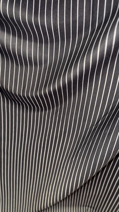 Pin stripes on spandex ponte de Roma fabric  2-way stretch 58/60” Sold by the YD. Ships worldwide from Los Angeles California USA.