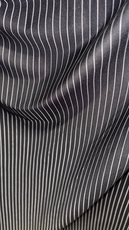 Pin stripes on spandex ponte de Roma fabric  2-way stretch 58/60” Sold by the YD. Ships worldwide from Los Angeles California USA.