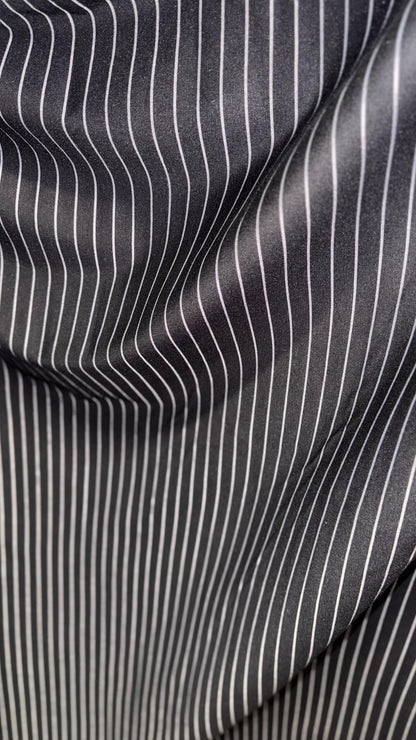 Pin stripes on spandex ponte de Roma fabric  2-way stretch 58/60” Sold by the YD. Ships worldwide from Los Angeles California USA.