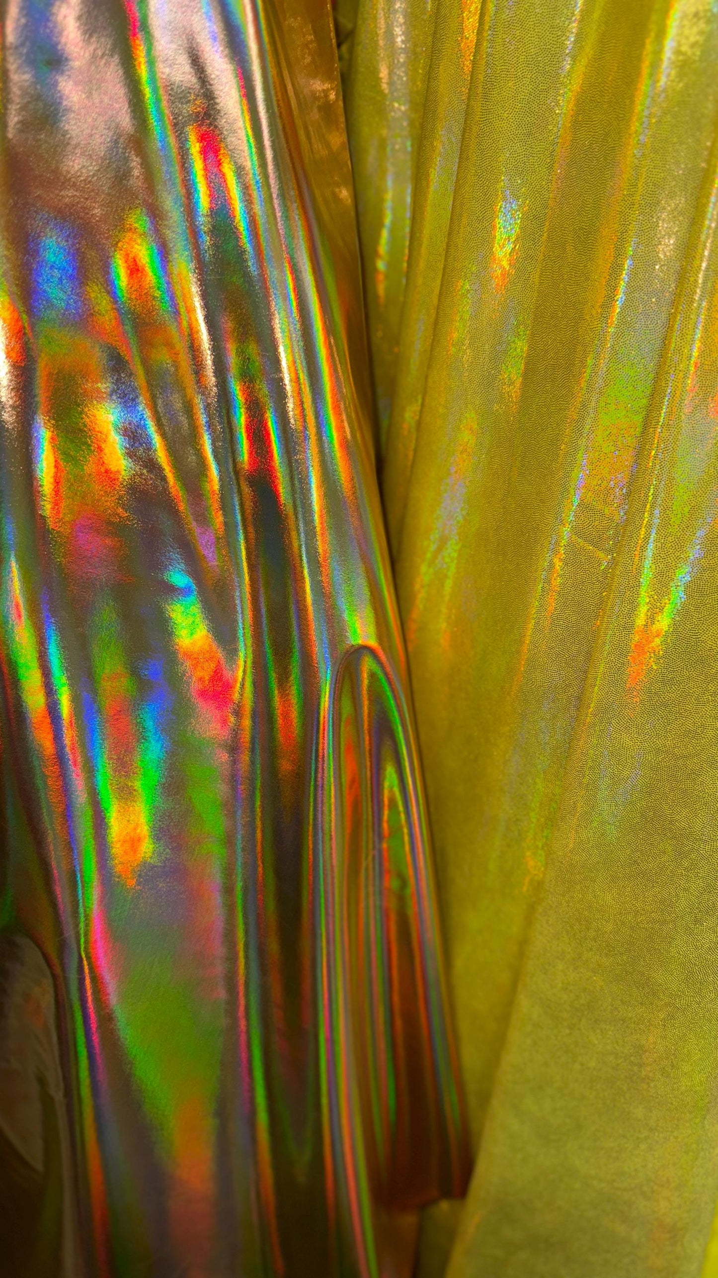 New Iridescent foggy foil oil effect metallic nylon spandex and iridescent metallic vinyl 4way stretch Sold by the YD. Ships worldwide