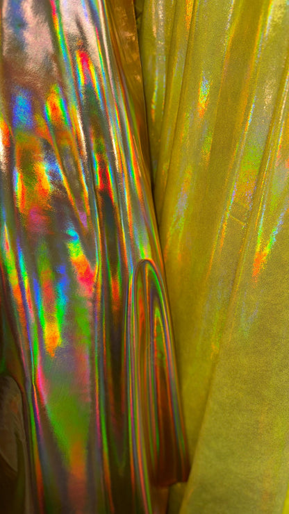 New Iridescent foggy foil oil effect metallic nylon spandex and iridescent metallic vinyl 4way stretch Sold by the YD. Ships worldwide
