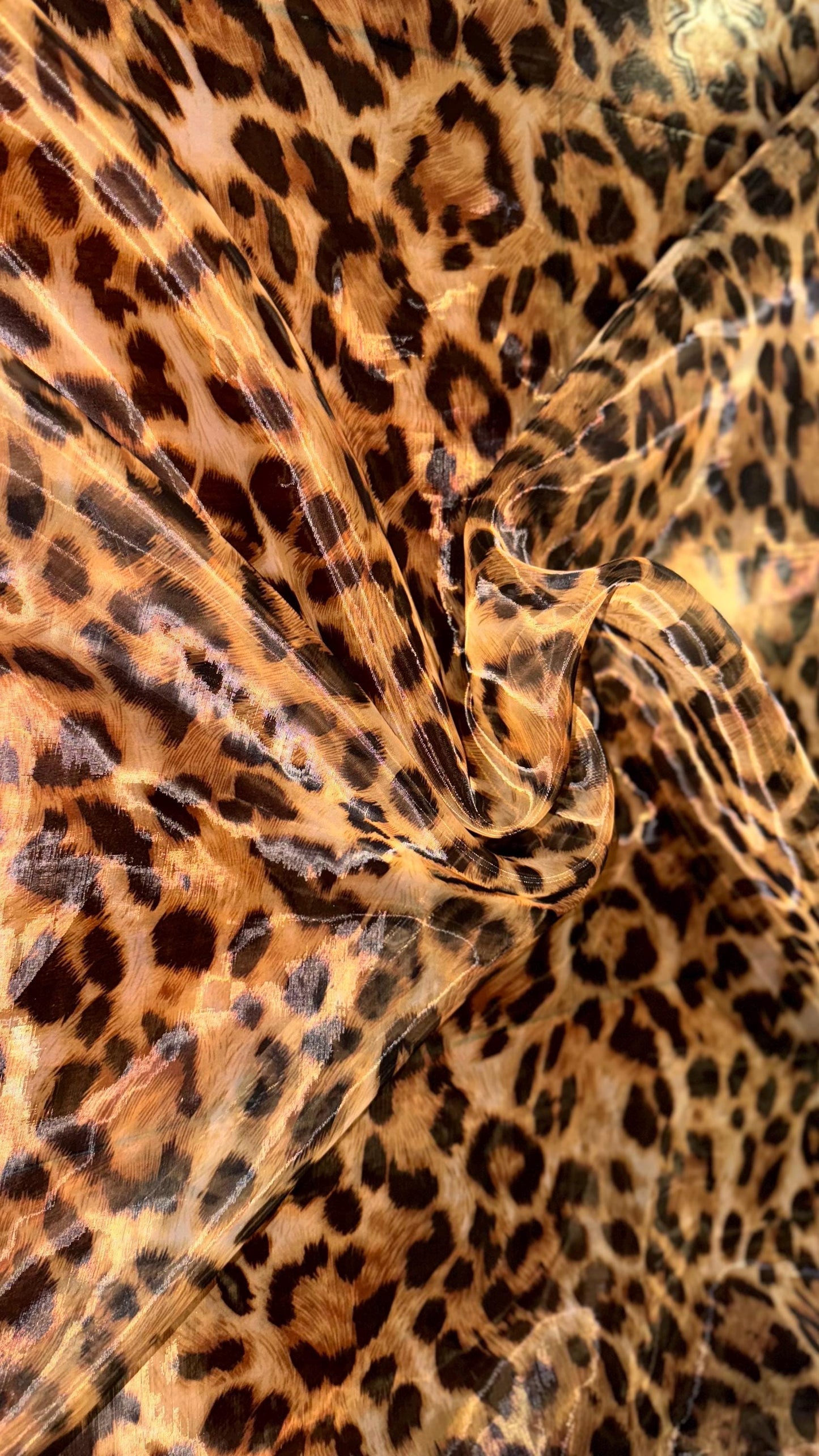 New Exotic Leopard design print on great quality of Mirror Silky Organza non stretch 58/60” Sold by the YD. Ships worldwide from LA CA