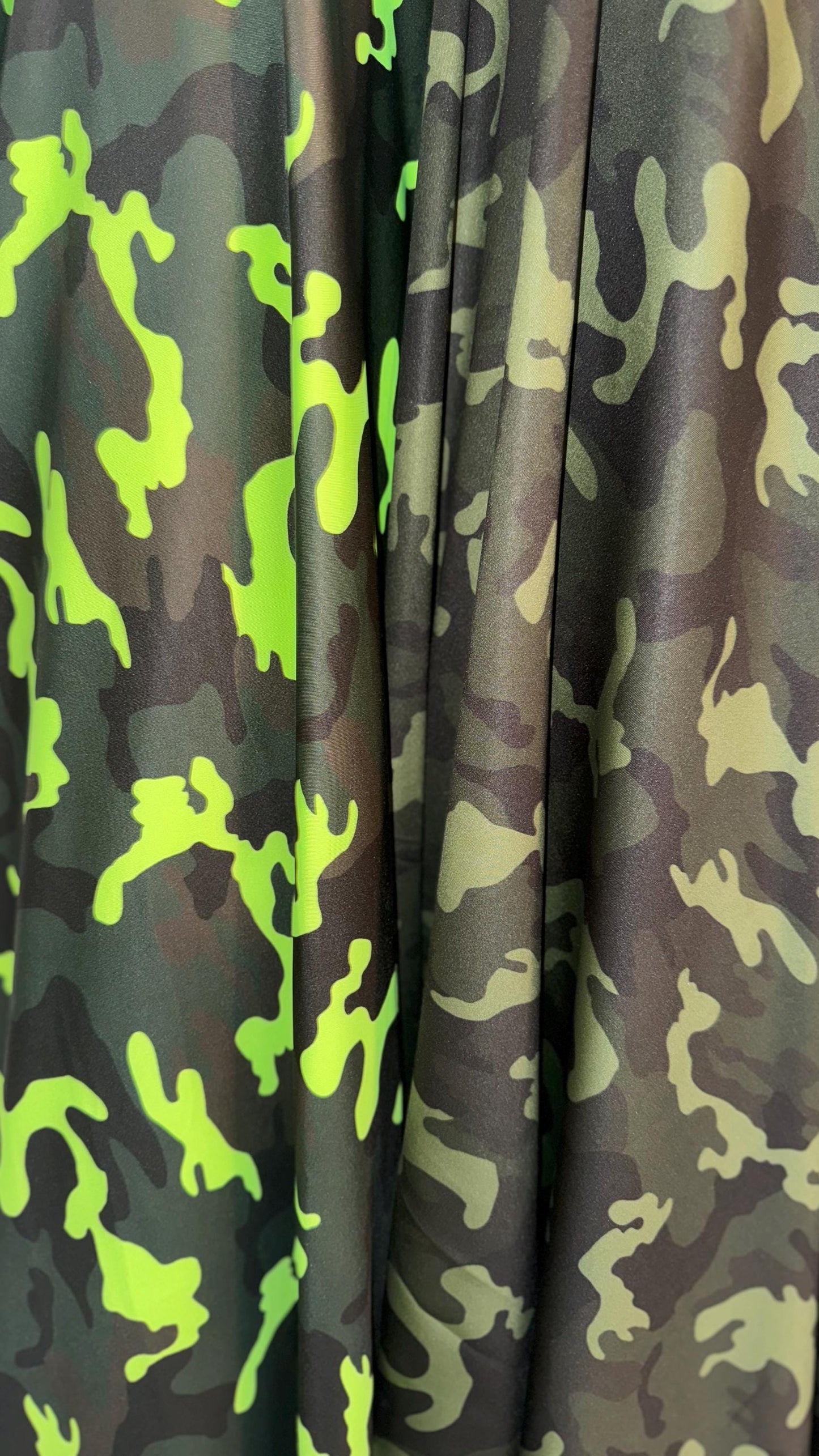 Camouflage design on great quality nylon spandex print 4way Stretch 64/65" Sold by the yd. Ships worldwide from Los Angeles California USA.