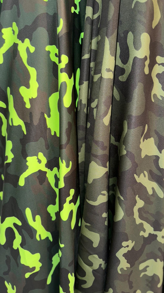 Camouflage design on great quality nylon spandex print 4way Stretch 64/65" Sold by the yd. Ships worldwide from Los Angeles California USA.