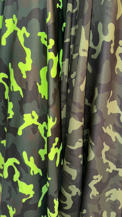 Camouflage design on great quality nylon spandex print 4way Stretch 64/65" Sold by the yd. Ships worldwide from Los Angeles California USA.