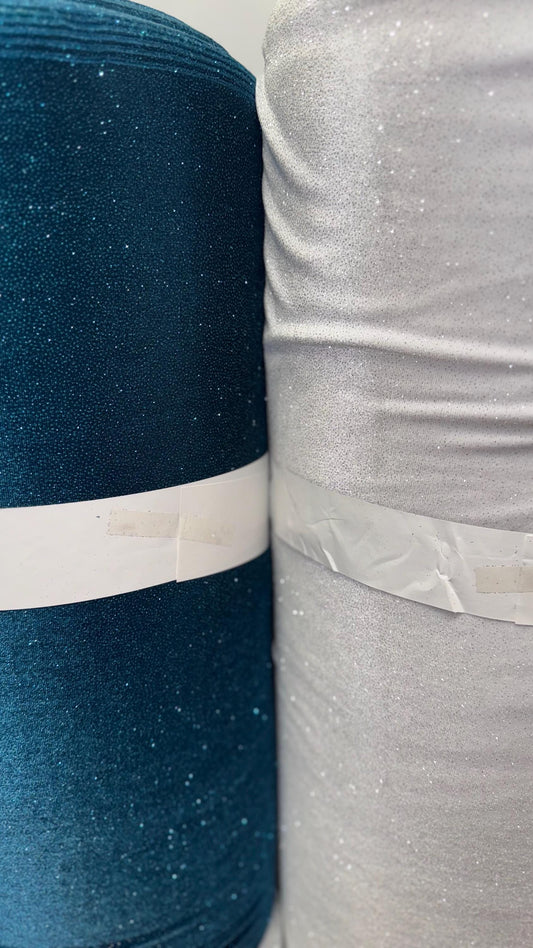Stretch velvet with glitter teal and White/Silver color heavy velvet 4way Stretch 58/60" Sold by the YD. Ships worldwide from Los Angeles