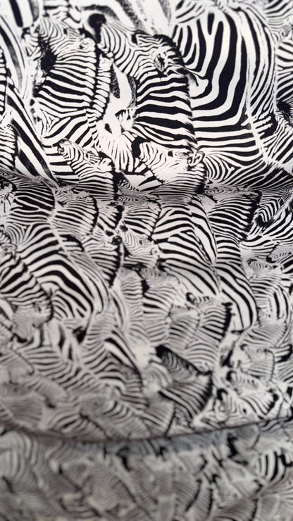 New Safari Zebra design print on nylon spandex 4-way stretch 58/60” Sold by the YD. Ships worldwide from Los Angeles California USA.