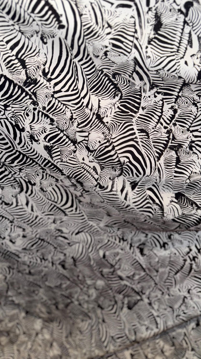 New Safari Zebra design print on nylon spandex 4-way stretch 58/60” Sold by the YD. Ships worldwide from Los Angeles California USA.