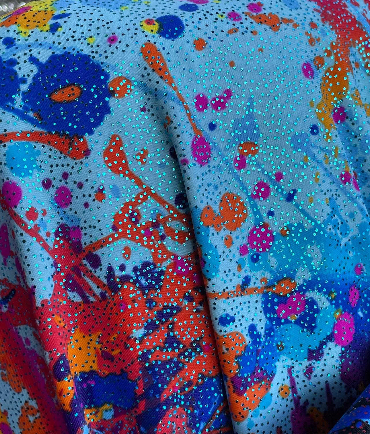 New Graffiti paint design print on nylon spandex with foggy foil 4way stretch 58/60" sold by the YD. Ships worldwide from Los Angeles CA