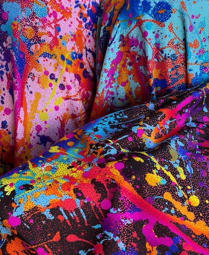 Graffiti paint design nylon spandex with foggy foil  4-way stretch. 58/60" sold by the YD. Ships worldwide from Los Angeles California USA