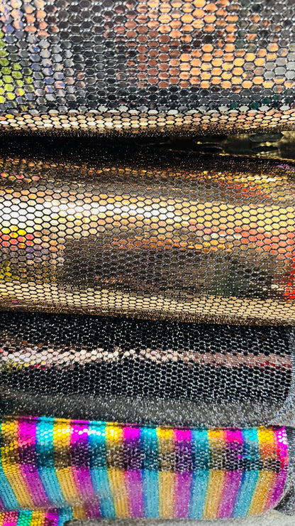Honeycomb Hologram iridescent sequins trans on Nylon metallic 2-way stretch 58/60” Sold by the YD. Ships worldwide from Los Angeles Californ