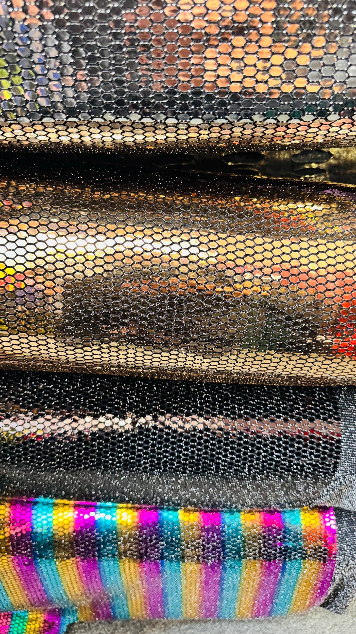 Honeycomb Hologram iridescent sequins trans on Nylon metallic 2-way stretch 58/60” Sold by the YD. Ships worldwide from Los Angeles Californ