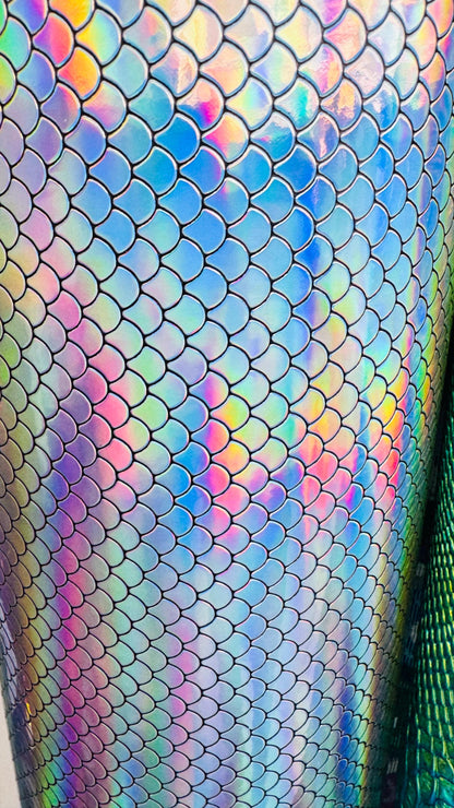 New Exotic Mermaid design super Iridescent vinyl with fish scales 55/56” Sold by the YD. Ships Worldwide from Los Angeles California USA.