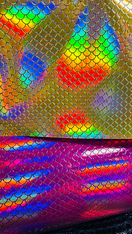 New Exotic Mermaid design super Iridescent vinyl with fish scales 55/56” Sold by the YD. Ships Worldwide from Los Angeles California USA.